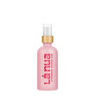 La Nua Strawberry Coconut Water-Based Lubricant 3.4 oz. next to a bottle of pink hair spray