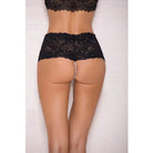 Black lace thong with satin bow accents and pearl boyshort on woman’s lower body