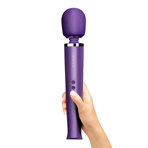 Le Wand Rechargeable Massager - Black: Purple microphone held up in the air