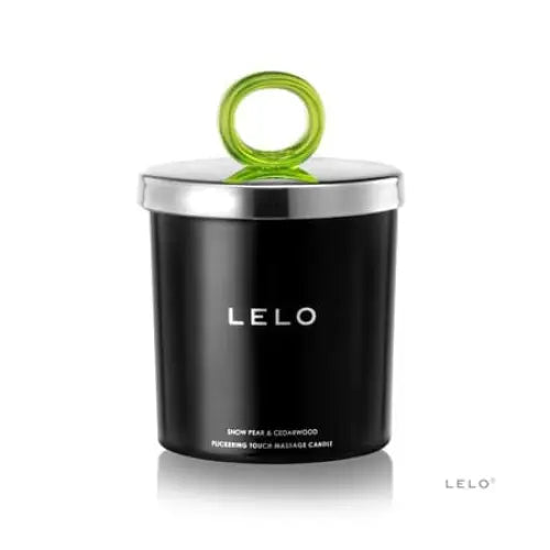 Black LELO Flickering Touch Massage Candle with a green ring on top for relaxation