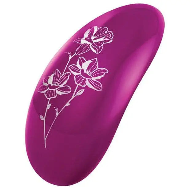 Purple LELO NEA 2 rechargeable clitoral stimulator with white floral design