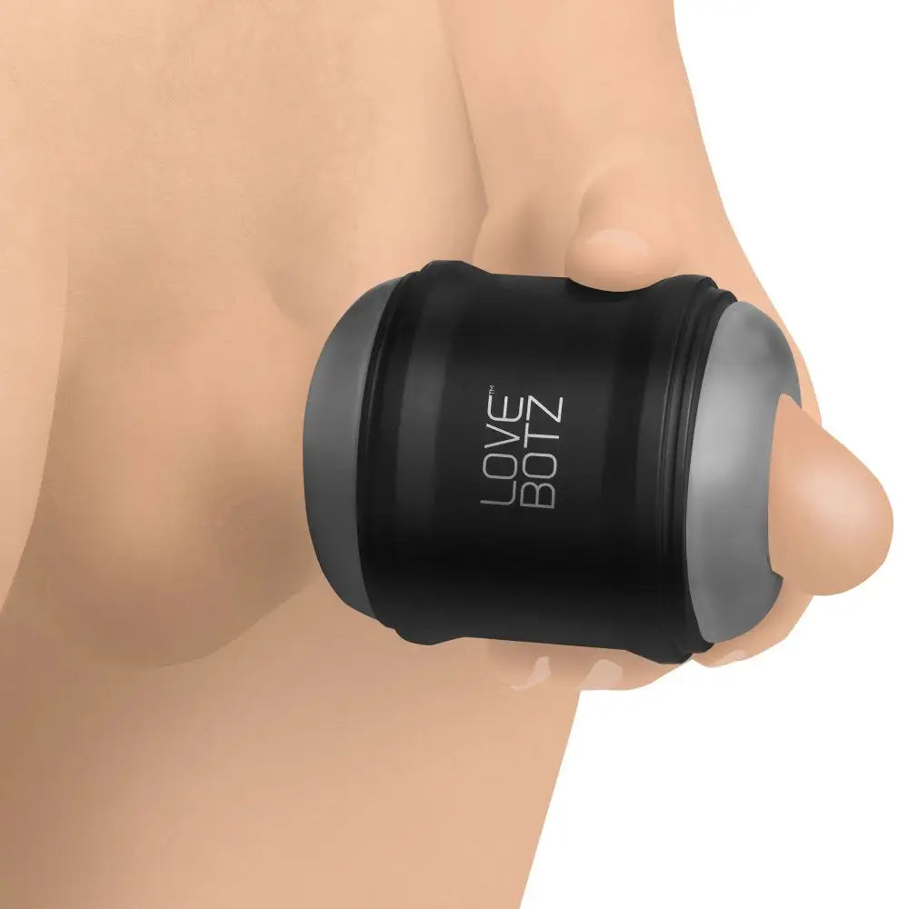 LoveBotz Mini Vibrating Double Stroker ’LOVE BITE’ used on skin