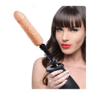 Woman holding LoveBotz Fucking Adapter Plus with Dildo, showcasing vacuum seal feature