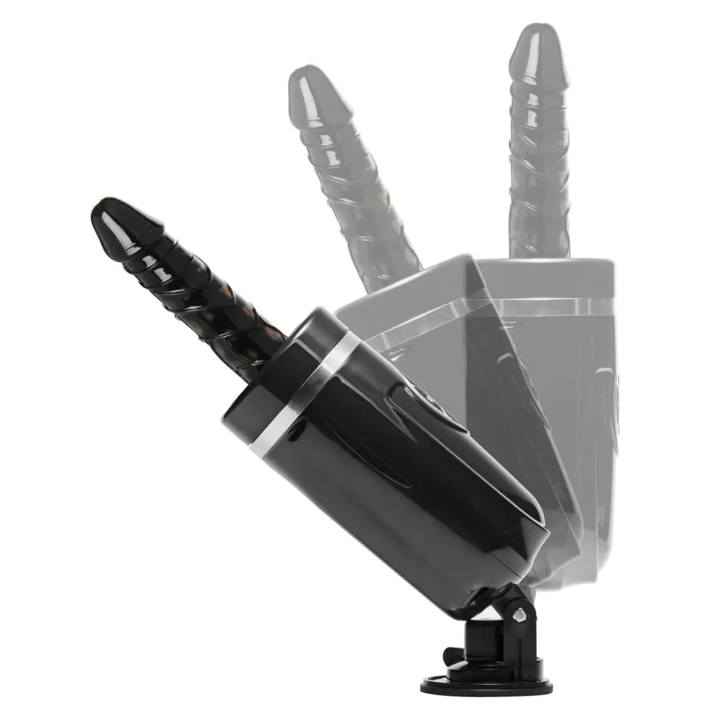 Close-up of a black hand with handle on LoveBotz Jaxxx Hammer 2.0 rechargeable sex machine