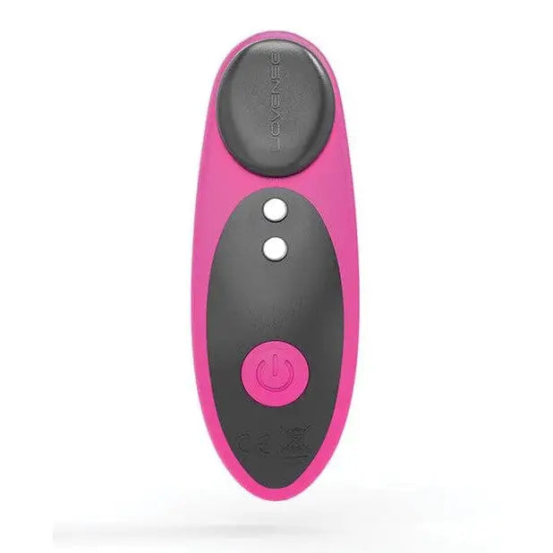 Close-up of Lovense Ferri panty vibe remote control with smiley face and magnetic cap