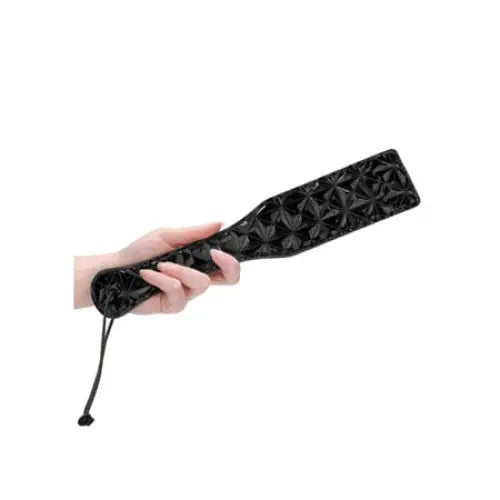 Luxury paddle black with marijuana leaf pattern, perfect for elegant and daring moments