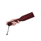 Luxury Paddle Burgundy: Decorative red and black geometric paddle, perfect for elegant use