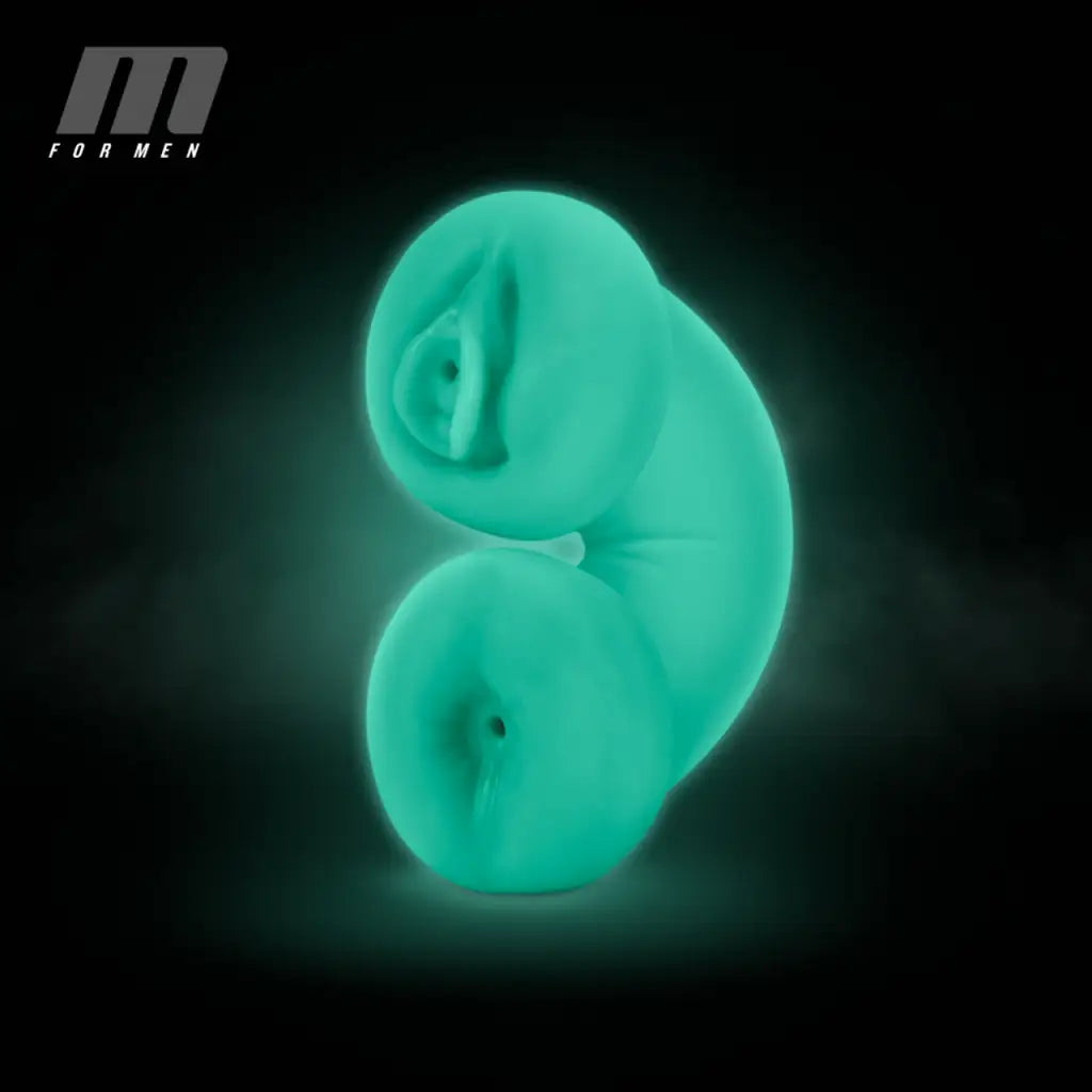 Glowing teal curled fetus shape in Blush M For Men Wet Double Trouble Glow In The Dark Stroker