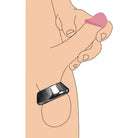 A person demonstrating the Magna-Chute Magnetic Ball Stretcher with a finger on their finger