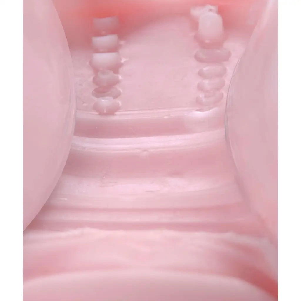 Maries Tight Mouth Stroker filled with pink liquid, enhancing your pleasure experience