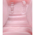 Maries Tight Mouth Stroker filled with pink liquid, enhancing your pleasure experience