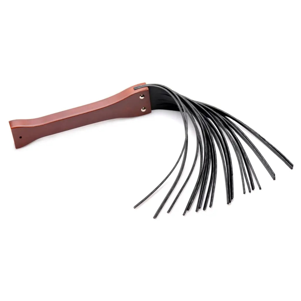 Master Lasher Wooden Flogger: Leather-handled, multiple black strands for ultimate control