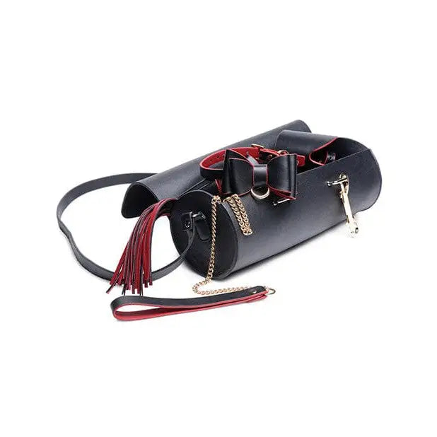 Master Series Bondage black leather handbag with red bow, part of the Bow Bondage Set