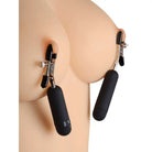 Master Series Dark Passion Vibrating Nipple Clamps on mannequin torso with weighted attachments