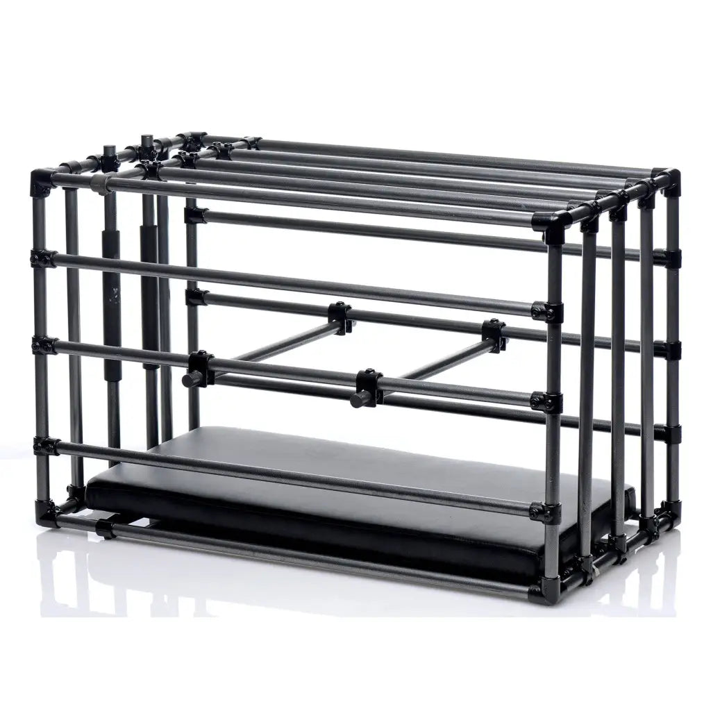 Black steel frame of kennel adjustable puppy cage attached behind padded board