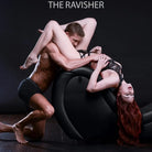 Man and woman on a black ball using the Master Series Kinky Couch Sex Chaise Lounge