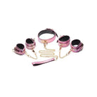 Master Series Snake Print pink leather bondage set with collar, cuffs, and gold chains