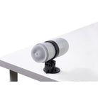 Adjustable desk lamp mounted on white surface with Maxtasy Suction Mount for stability