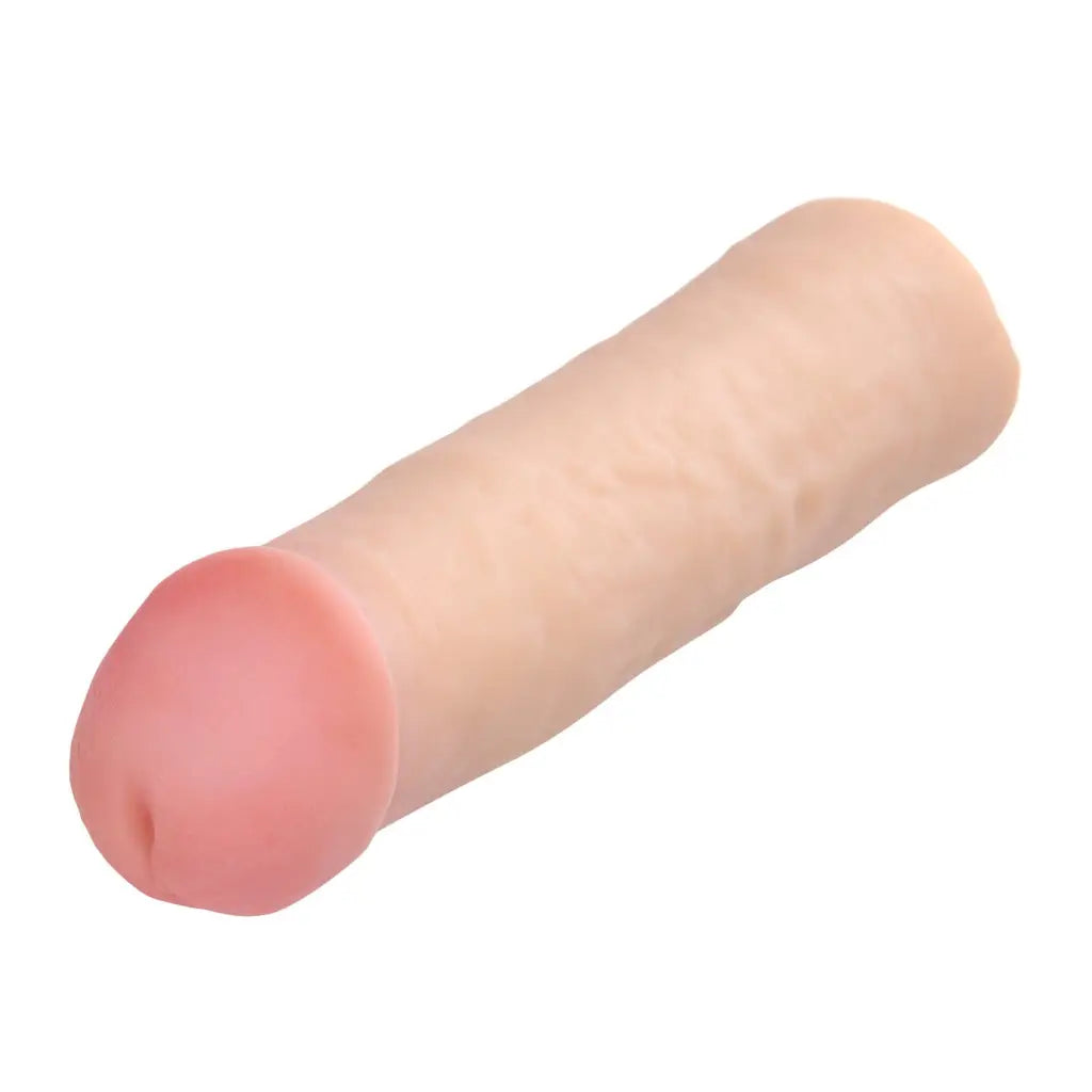 Mega Enlarger Sleeve Penis Enhancer showcasing pink flesh on a white background