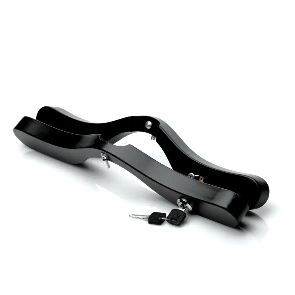 Sleek black motorcycle handlebar with attached keys from Isabella Sinclaire’s E-Stim Locking Humbler