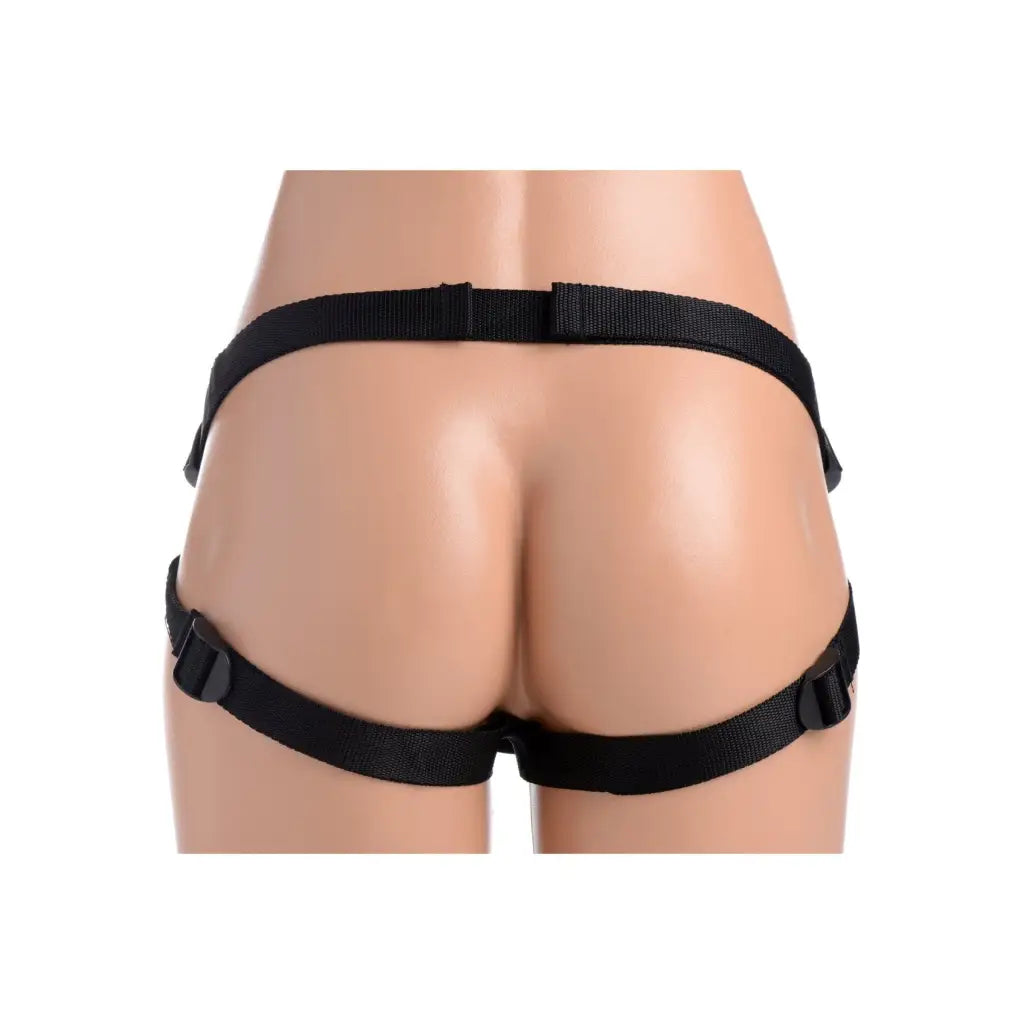 Black strap harness from Mistress Femdom Pegging Kit on hips and buttocks of mannequin