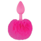 Neon Luv Touch Bunny Tail with pink heart-shaped candle in a pink candle holder