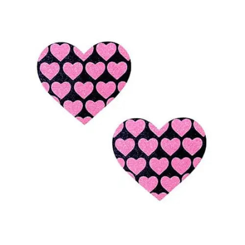 Neva Nude Pink Heart UV Valentines Black Glitter Nipztix Pasties on black background