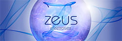 Zeus E-Stim Pro Silicone Cock Ring Vibe displayed in a spherical glass fishbowl with ‘Zeus’ text.