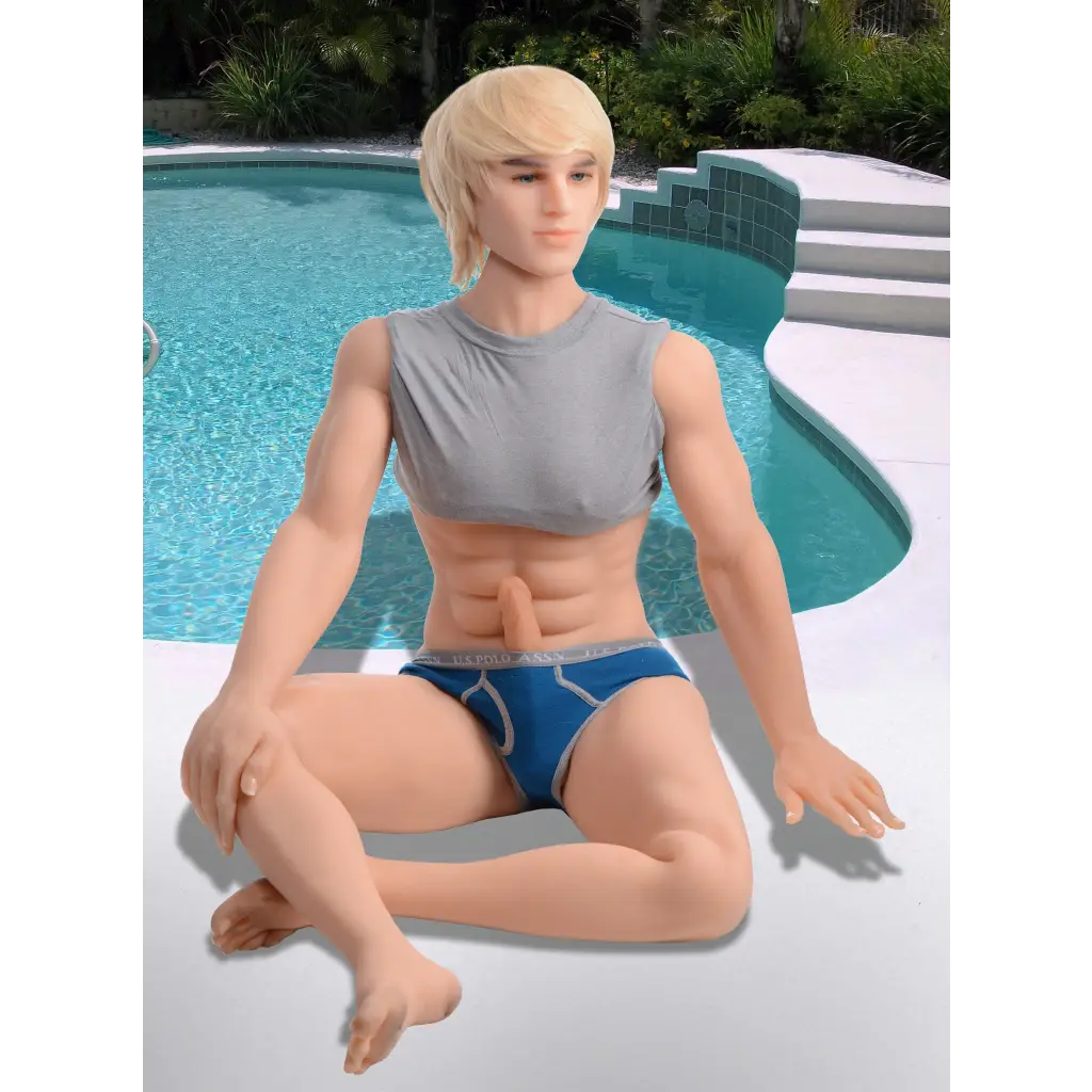 A woman in a bikini sitting next to a pool with the NextGen Dolls - Kyle Fantasy Love Doll