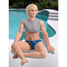 A woman in a bikini sitting next to a pool with the NextGen Dolls - Kyle Fantasy Love Doll