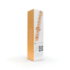 Nobu Honey Dual Wand - Amber: Glass sex toy with honeycomb pattern in retail packaging