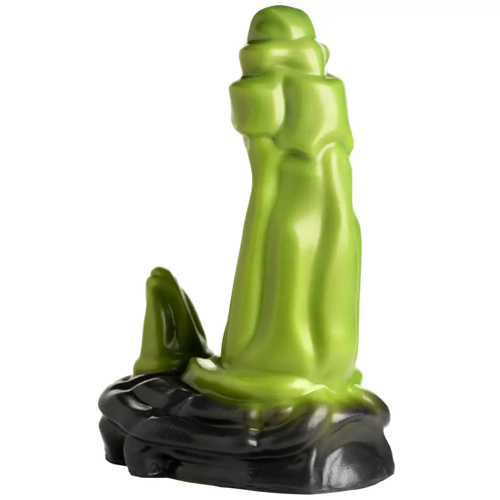 Orc Silicone Dildo: Green statue with black suction cup base for dual stimulation