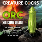 Orc Silicone Dildo with Creature Rocks statue, compatible with water-based lubricants