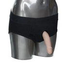 Packer Gear Brief Harness by CalExotics: black underwear with protruding flesh-toned appendage