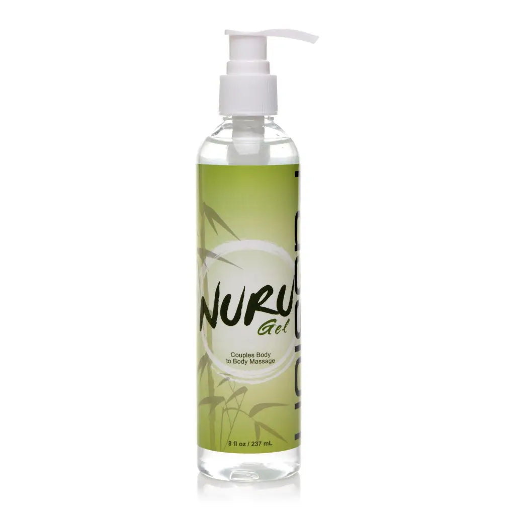 Bottle of Nuru gel with pump on inflatable massage sheet from Passion Lubricants Nuru Kit