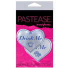 Heart-shaped ’Drink Me’ pasties in packaging labeled ’Pastease Premium Eat Me Drink Me Liquid Heart’