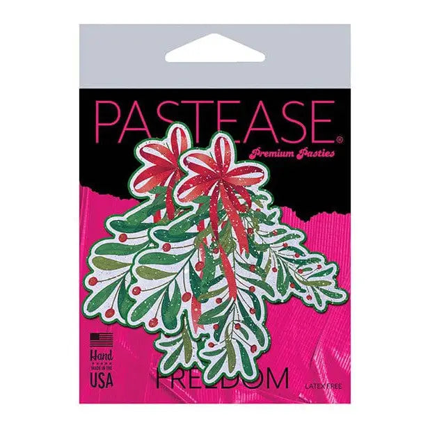 Festive mistletoe-shaped Pastease Premium Holiday pasties with red berries and green leaves