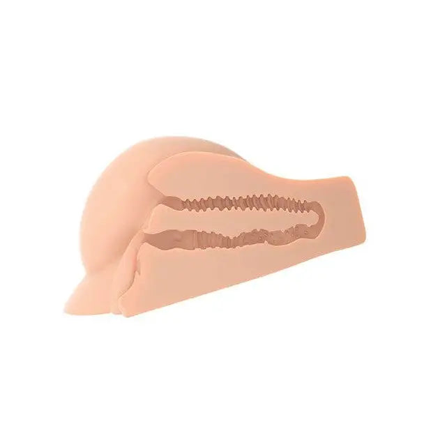 Small pink plastic animal head with long tail displayed on PDX Plus Perfect Ass XL Masturbator