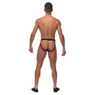 Man in Peak Performance Sport Jockstrap, viewed from behind, showcasing peak performance wear