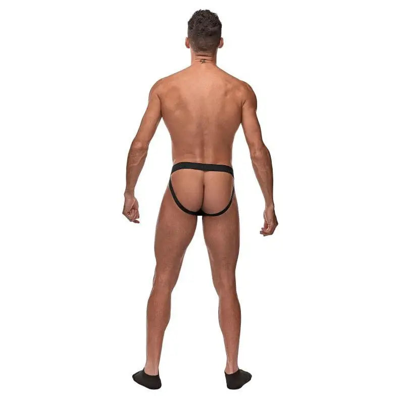 Man in Peak Performance Sport Jockstrap, viewed from behind, showcasing peak performance wear