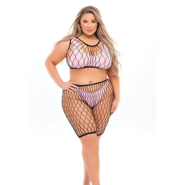 Woman in pink lipstick ’Brace For Impact’ fishnet top, shorts, bra & thong by Rene Rofe