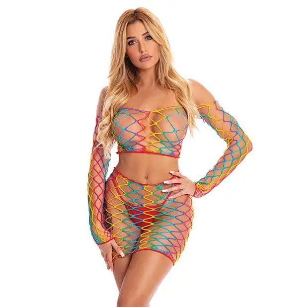 A woman in colorful Pink Lipstick ’Pot Of Gold’ Rainbow Fishnet Top and Skirt Set by Rene Rofe