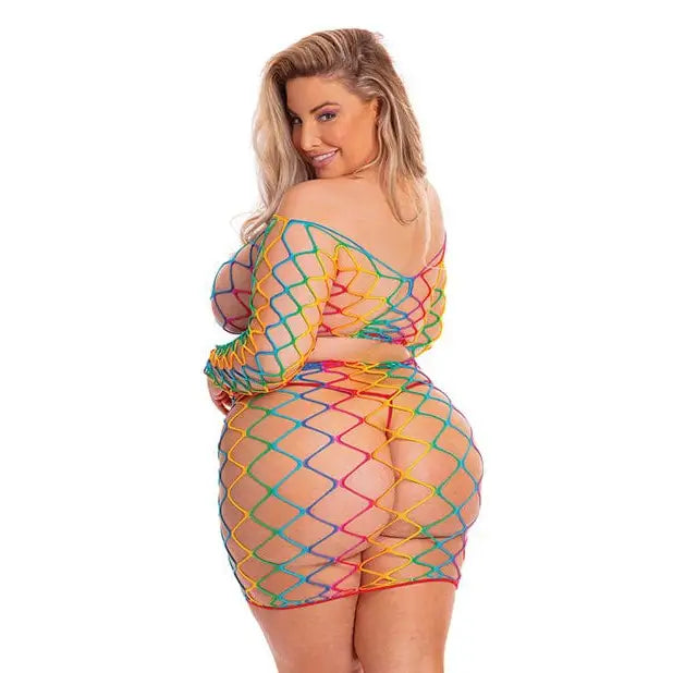 Woman in colorful Rainbow Fishnet Top and Skirt Set by Rene Rofe, perfect with pink lipstick