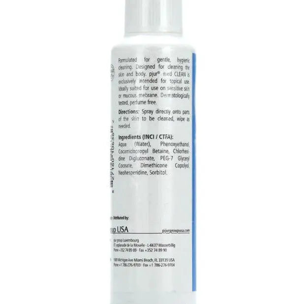 Bottle of pjur med CLEAN Spray with white liquid and blue cap for hygiene and wellness