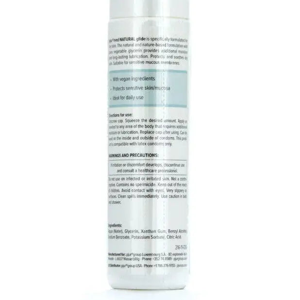 A bottle of pjur med NATURAL glide Silicone Lubricant with a blue label