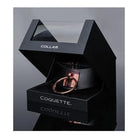 Close up of the Pleasure Collection Adjustable Collar box with a ring inside by Coquette