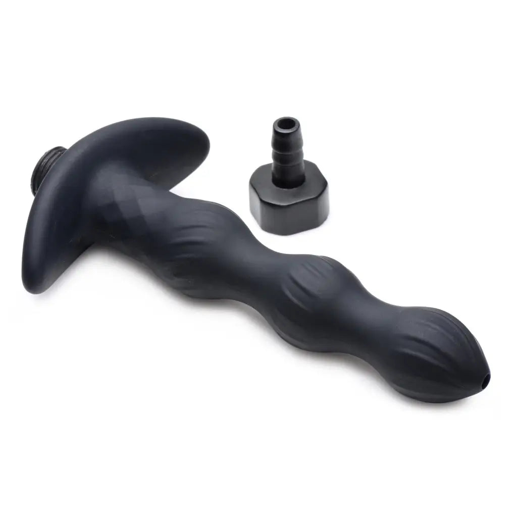 Pleasure Flow 10x Vibrating Enema Tip: Black silicone anal plug with curved shape and flared base