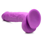 Purple silicone sex toy with suction cup base from Pop Peckers 8.25’ Dildo with Balls