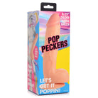 Colorful ’Pop Peckers’ 8.25’ dildo with suction cup base on display in packaging