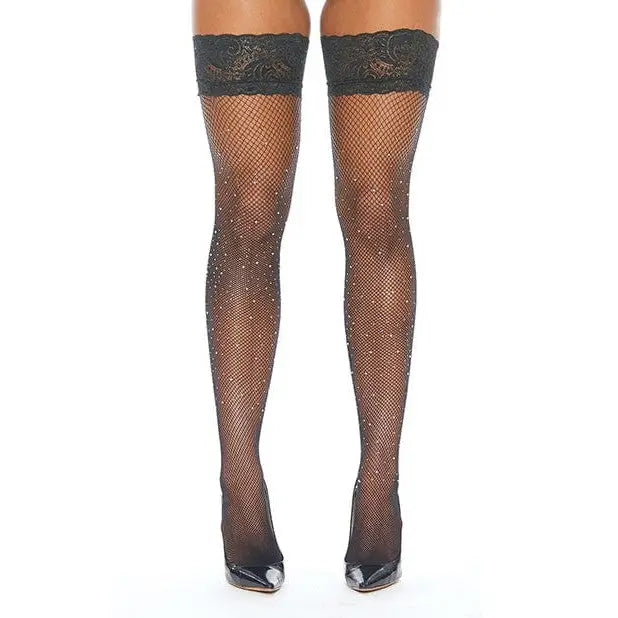 Woman wearing Popsi Lingerie Rhinestone Stay-Up Thigh High fishnet stockings